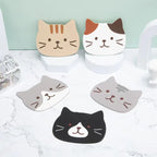 Cat Coaster Set: tabby, calico, grey, grey-and-white and tuxedo cat-face coasters on a white marble table