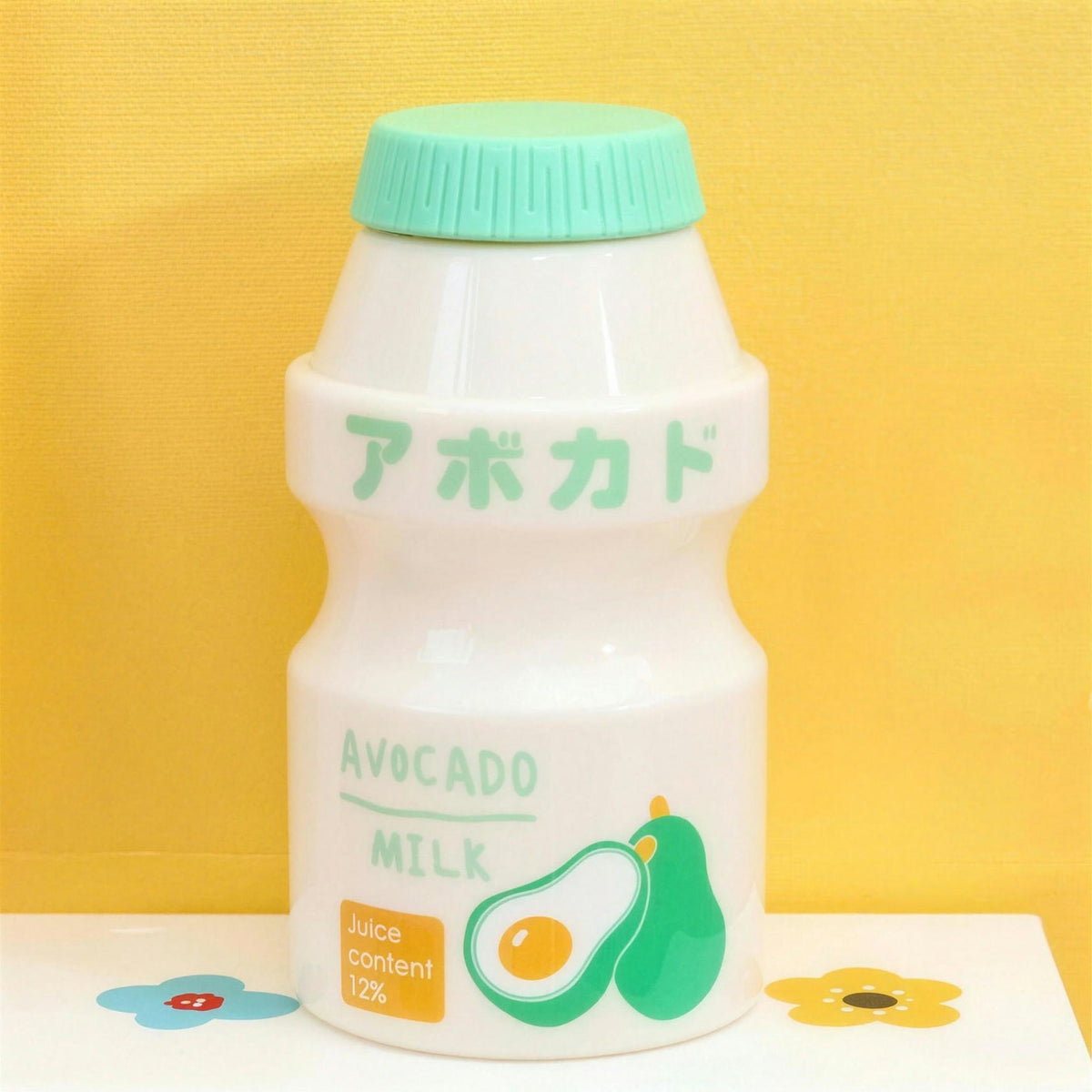 Opaque avocado fruit milk water bottle with green lid
