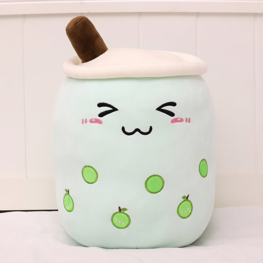 Boba Plush Pillow in mint with closed eyes and fruit prints, front view