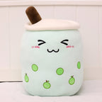 Boba Plush Pillow in mint with closed eyes and fruit prints, front view