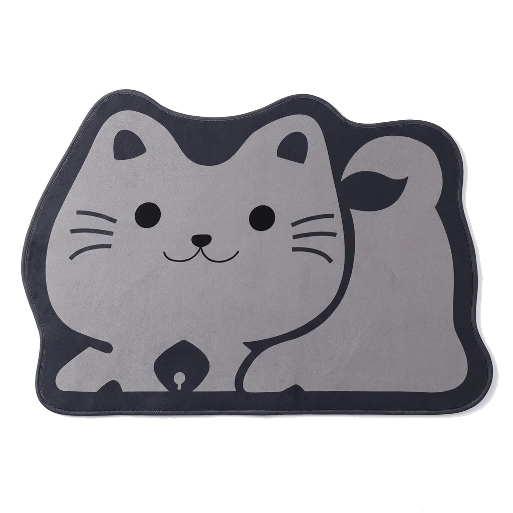 Cat Bath Mat, Grey Cat design, on white seen from above: a mat cut around a cartoon grey cat lying on its side with its head up