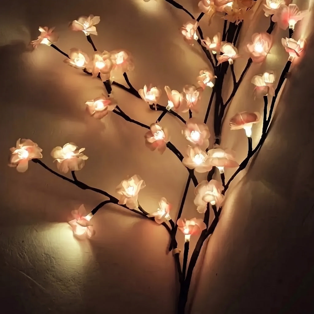 Close-up of the lit pink blossoms on the Cherry Blossom Branch Light