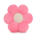 Flower Plush Pillow in pink, six smooth plush petals with a cream center, on a white background