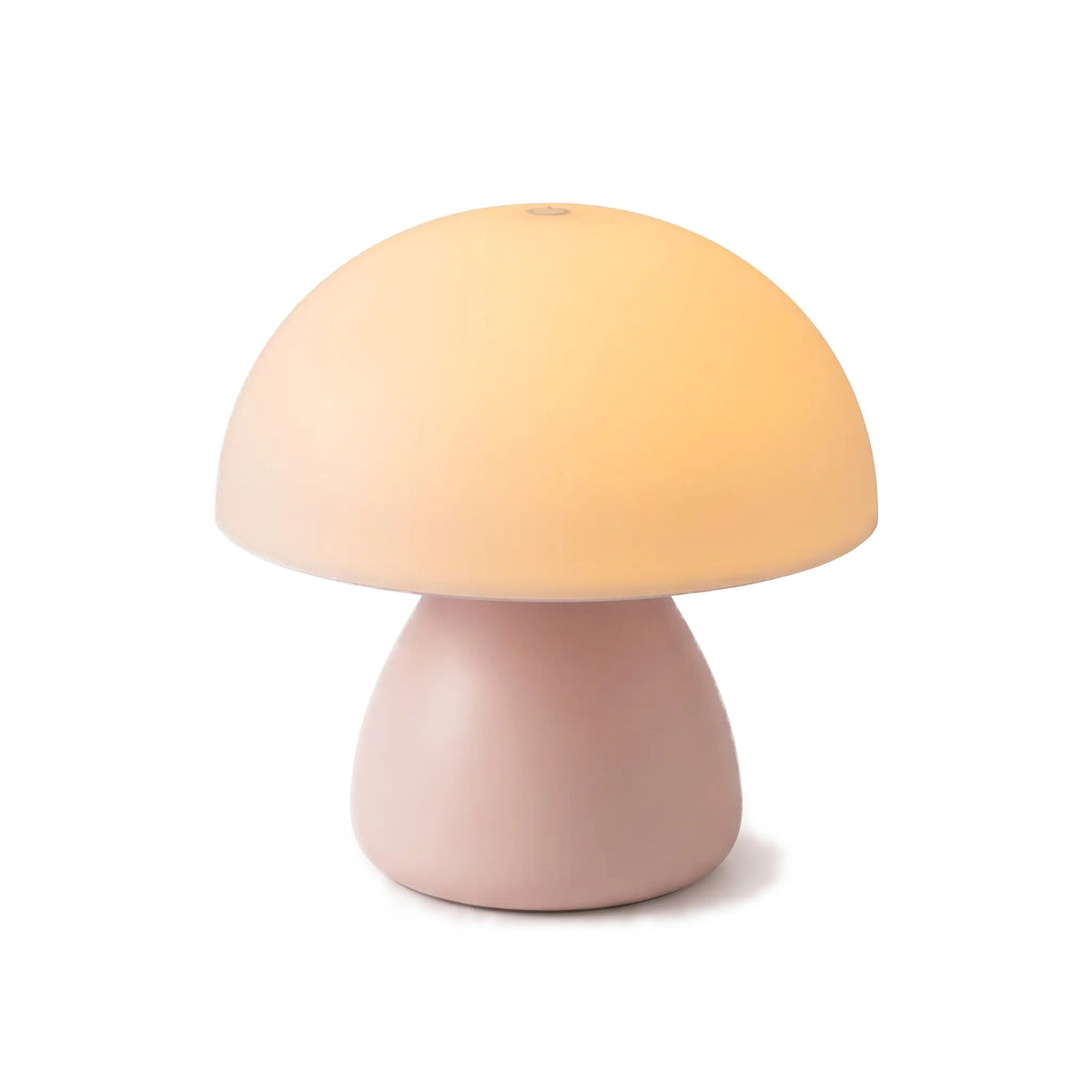 Mini Mushroom Touch Lamp in Pink, lit, on a white background