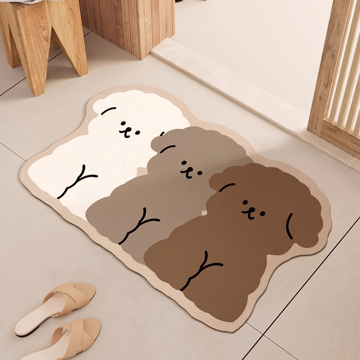 Puppy Trio Bath Mat on a tiled bathroom floor beside a wooden stool