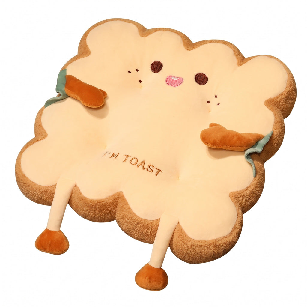 Toast Seat Cushion with the Cheeky face, a plush slice of toast with an embroidered face, arms and dangling legs, on a white background