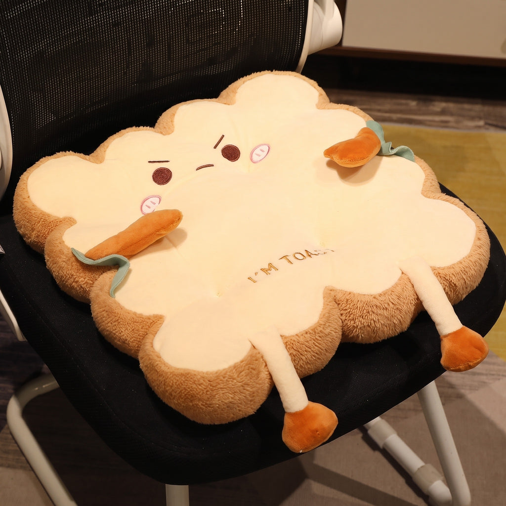 Toast Seat Cushion with the Grumpy face on a black office chair