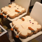 Two Toast Seat Cushions, Cheeky and Happy faces, on white dining chairs